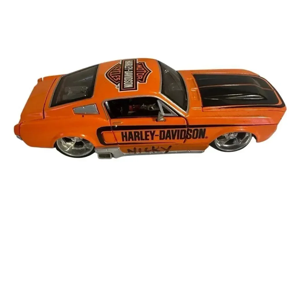 Harley-Davidson Black and Orange Toy Car